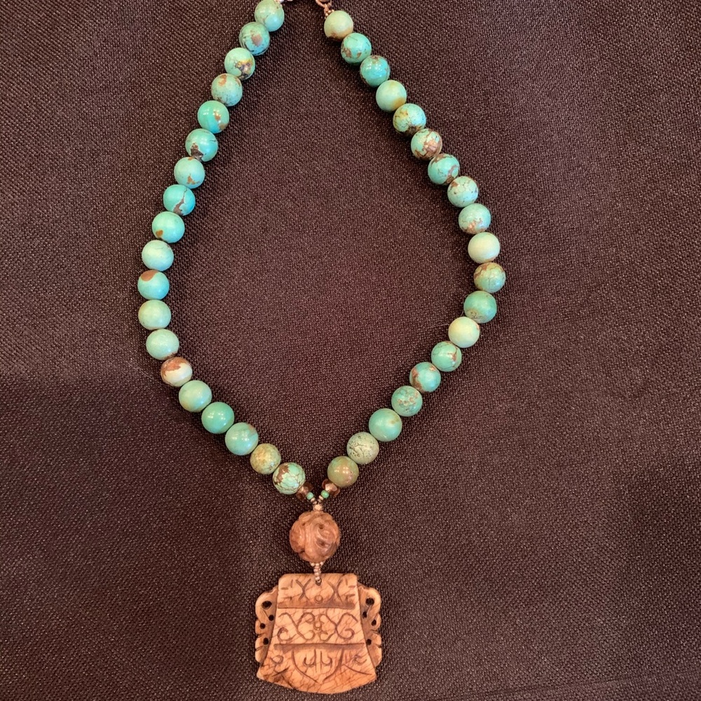 Turquoise stones with Tribal charm